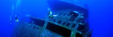 Divers on the side of the El Aguila shipwreck